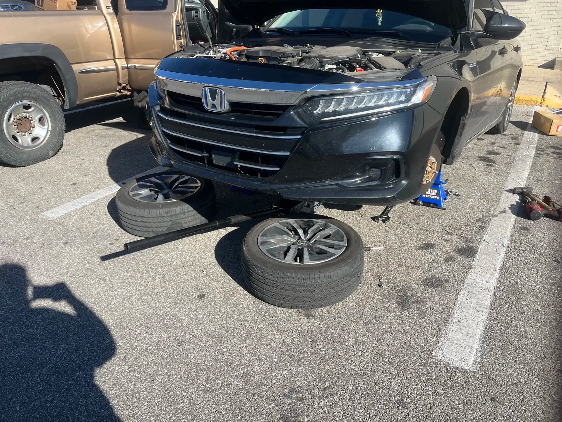 Vehicle safely supported for mobile wheel service in a Columbus-area parking lot